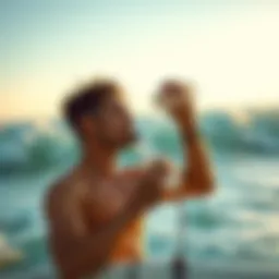A surfer hydrating before hitting the waves