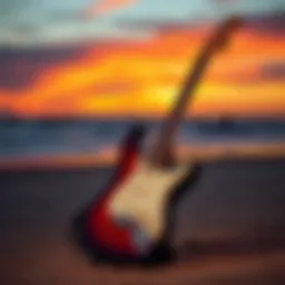 Electric guitar on the beach at sunset