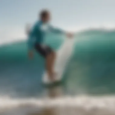 A surfer testing the performance of a surfboard made from foam blank.