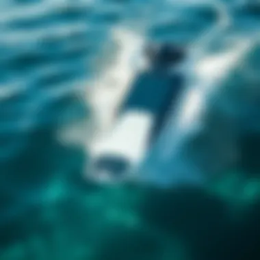 Sleek Motorized Surfboard in Action A sleek motorized surfboard gliding over crystal clear waves