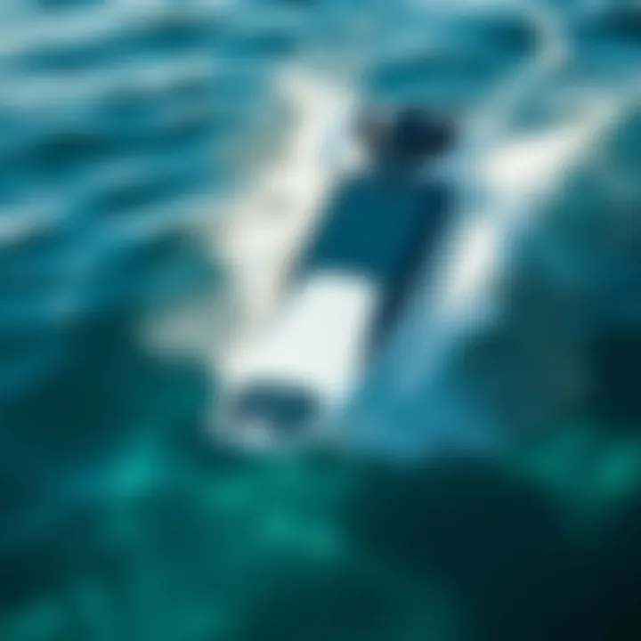 Sleek Motorized Surfboard in Action A sleek motorized surfboard gliding over crystal clear waves