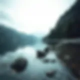 A serene lake with perfect skipping stones on the shore