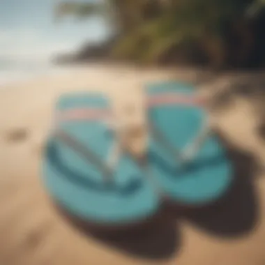 Close-up of flip flops with surfboards in the background