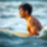 Surfer in Ocean Mastering Breath Control Surfer practicing breath hold exercises in the ocean
