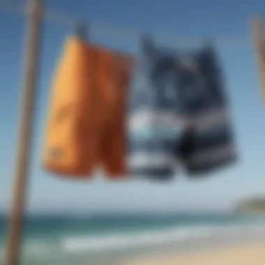 Diverse styles of board shorts hanging on a clothesline