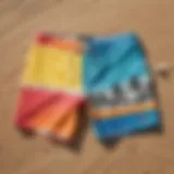 Vibrant board shorts displayed on a sunny beach