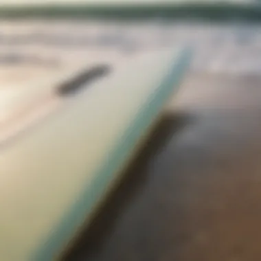 Close-up of a surfboard on the beach