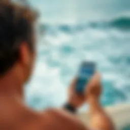 A surfer checking wave conditions on a smartphone app