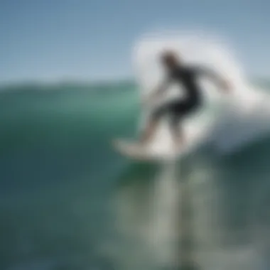 Surfer demonstrating performance of a wave rider surfboard on a wave