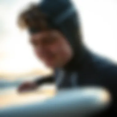 Techniques for Maintaining Wetsuit Gear Surfer evaluating gear maintenance techniques for wetsuit accessories