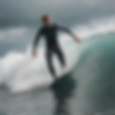 Surfer wearing a wetsuit in action on waves