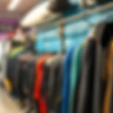 Variety of Wetsuit Types Diverse types of wetsuits displayed on a rack