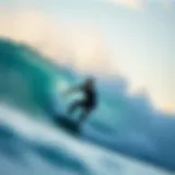 A surfer in a sleek wetsuit riding a wave